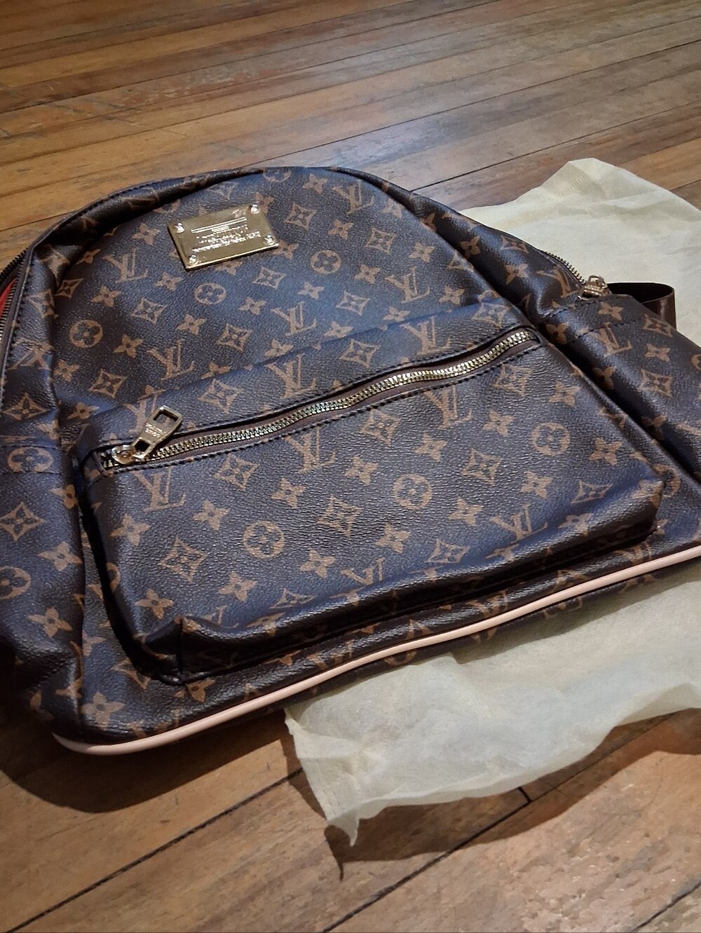 Monogram Canvas Backpack with Gold Hardware